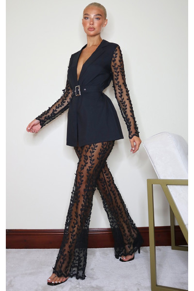 Чорні плетені розкльошені штани з прозорого мережива