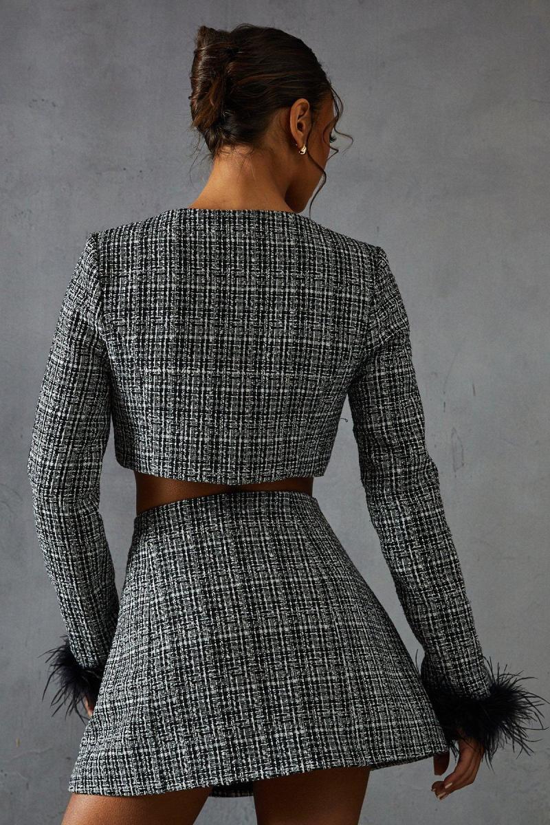 Міні-спідниця Boucle High Tast