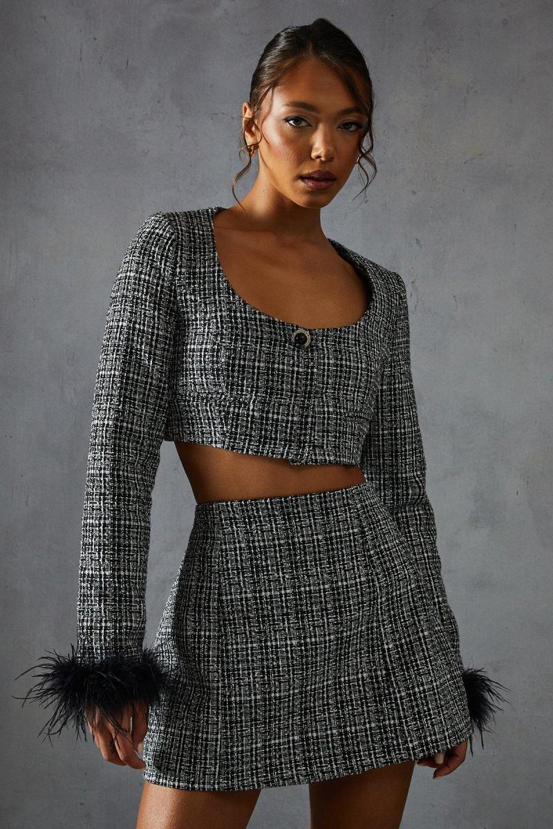 Міні-спідниця Boucle High Tast