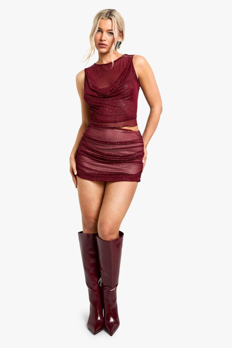 Міні-спідниця з блискучою сіткою і рюшами