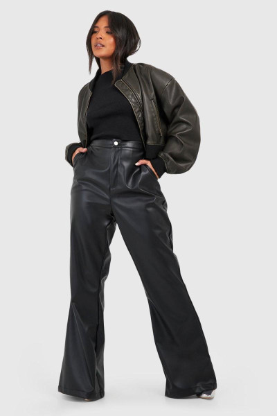 Плюс кльошові брюки Pu