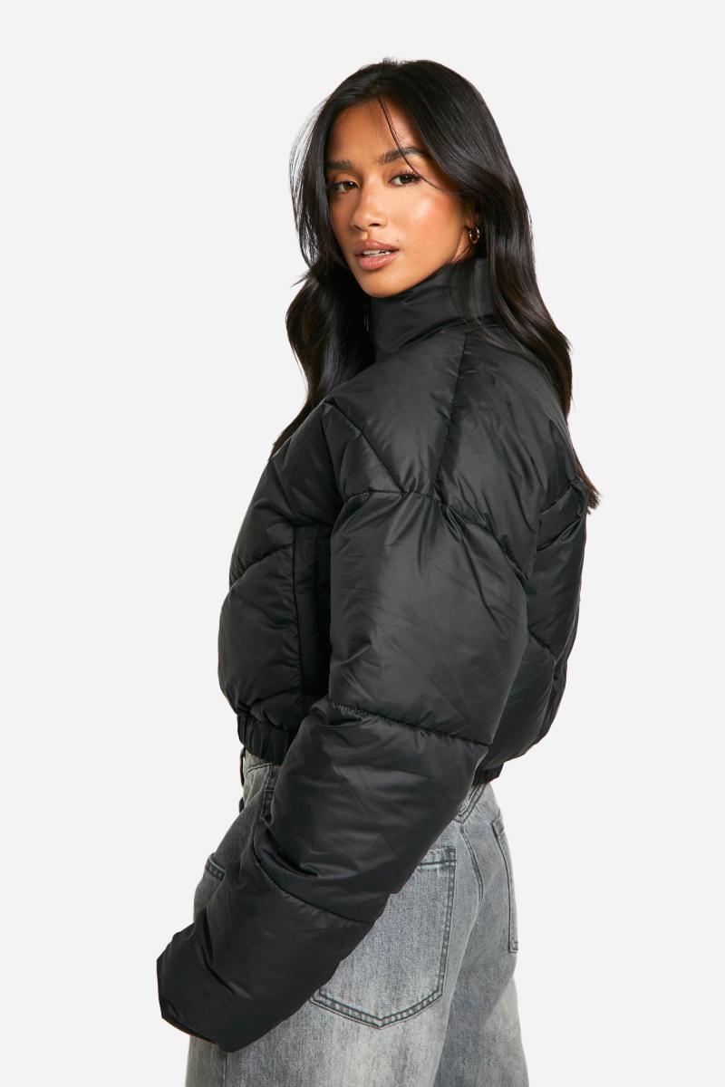 Маленький піджак з стьобаною лійкою шиї