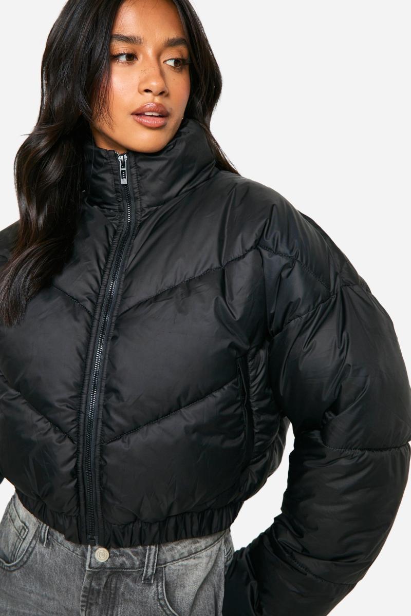 Маленький піджак з стьобаною лійкою шиї