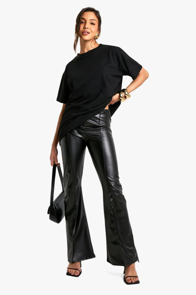 Поліуретанові штани з розкльошеними штанинами та защипами