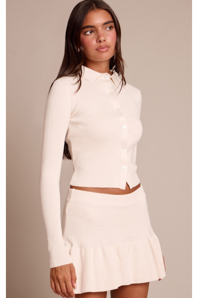 Кремова кнопка через в’язаний верх