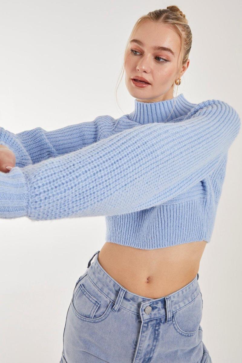 Висока в’язана на шиї джемпер