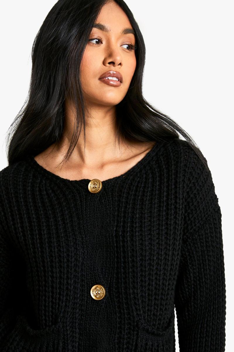 Кучерява в’язана кнопка деталі негабаризації в’язаного кардигану