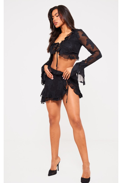 Чорна текстурована шифонова міні-спідниця з оборками збоку